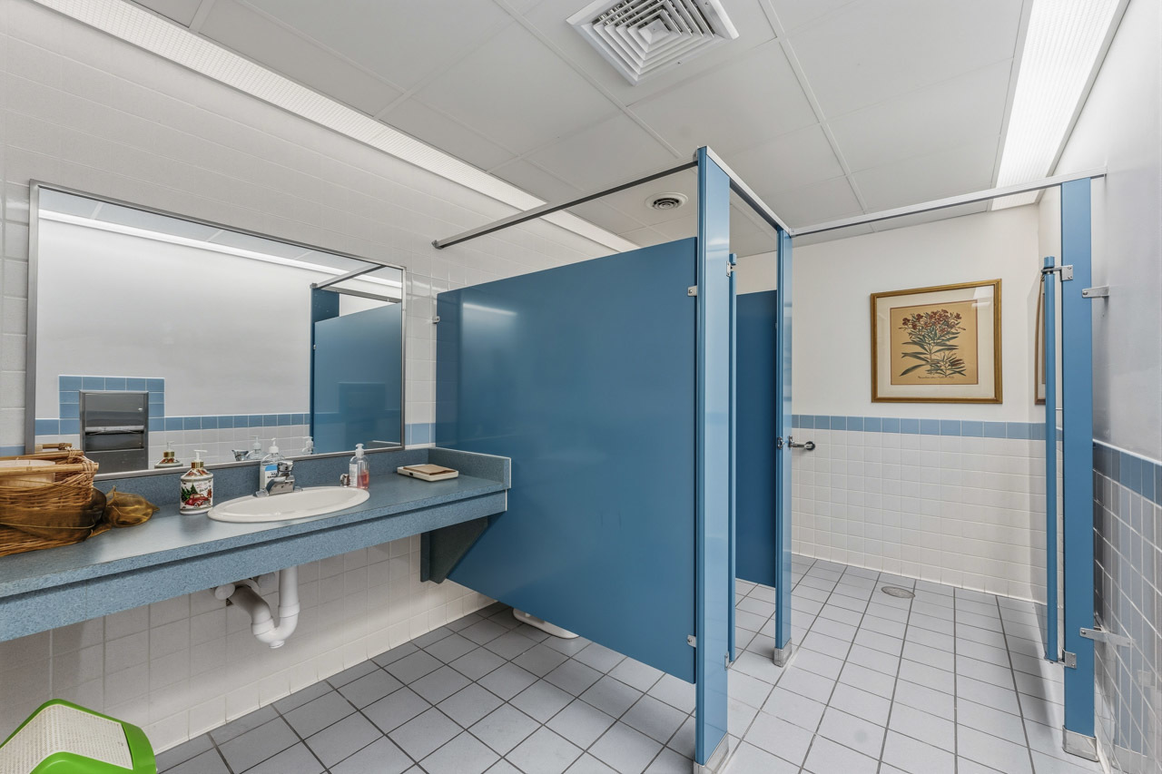 10330 336th Avenue Randall, WI 53181 - Photo 10 of 29 a bathroom with a sink mirror and vanity