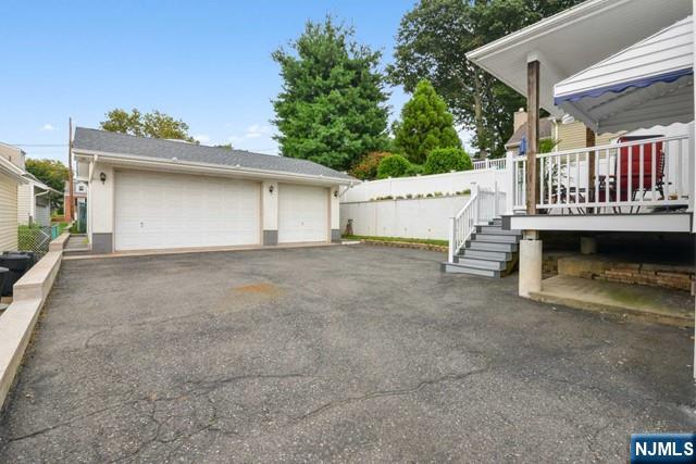 39 Springfield Avenue, Unit 2 Hasbrouck Heights, NJ 07604 - Photo 12 of 13 a view of an outdoor space and a garage
