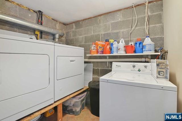 39 Springfield Avenue, Unit 2 Hasbrouck Heights, NJ 07604 - Photo 9 of 13 a utility room with dryer and washer