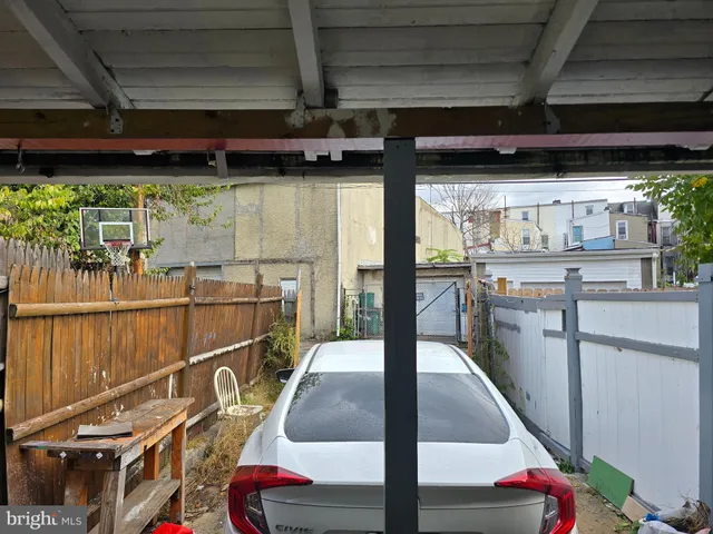 a car parked in front of a house