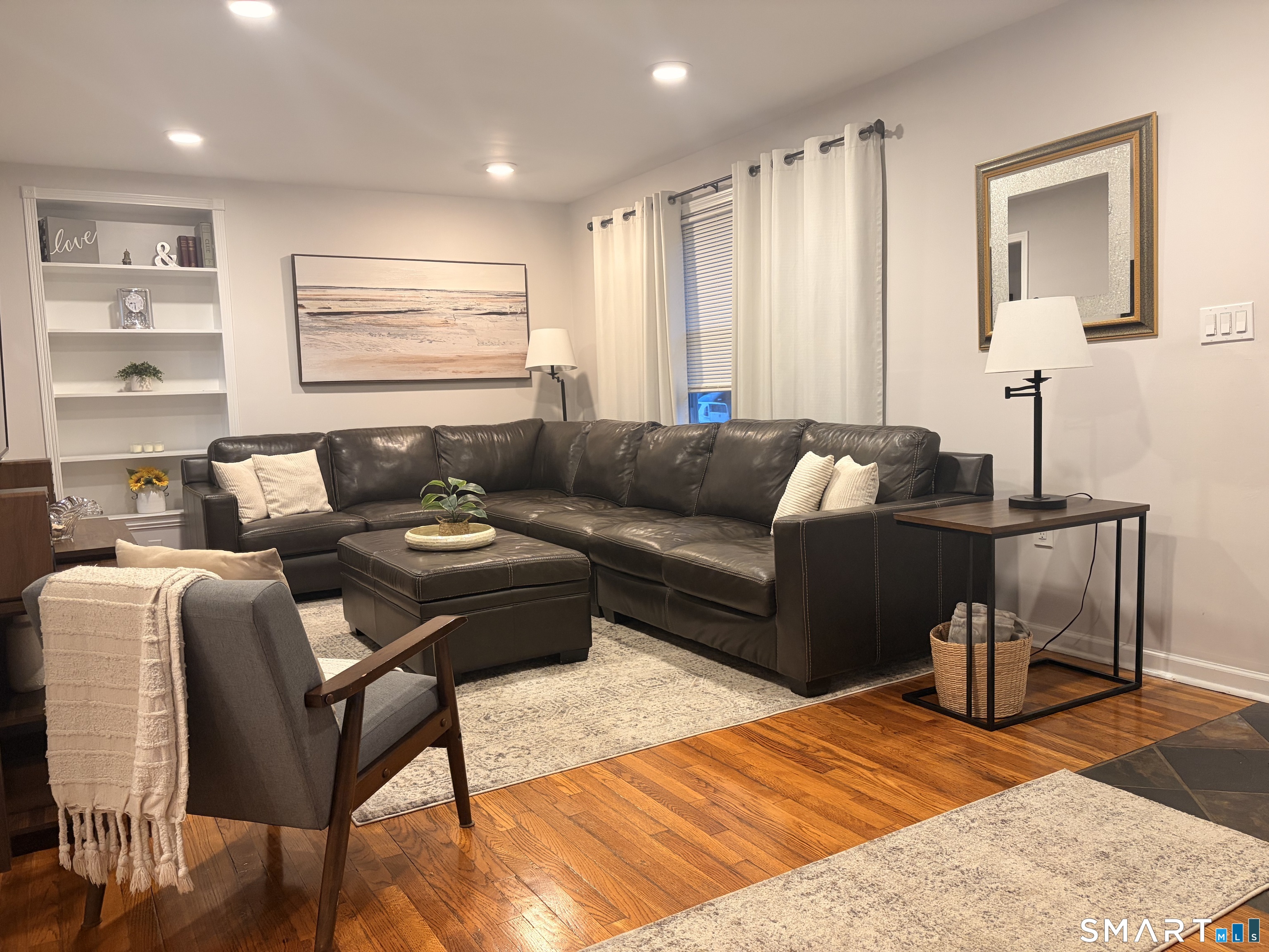 64 Belden Road Hamden, CT 06514 - Photo 3 of 27 Recessed lighting and hardwood floors throughout