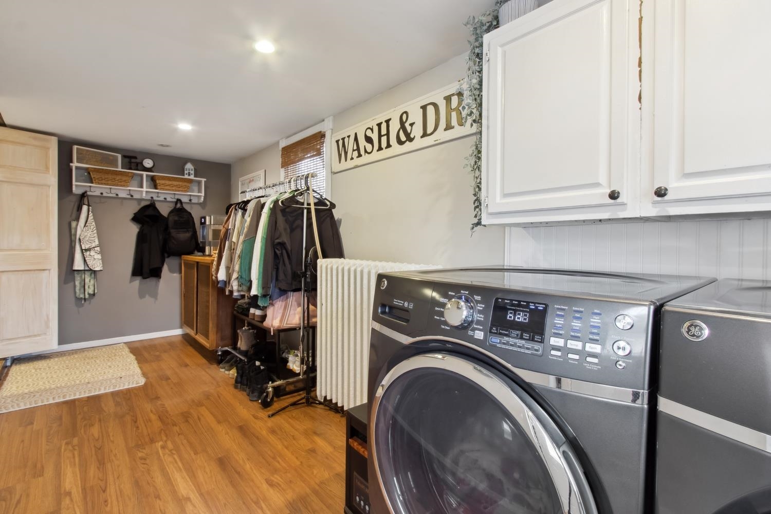 108 Maple Avenue Morrison, IL 61270 - Photo 22 of 28 a view of a storage and utility room with washer and dryer