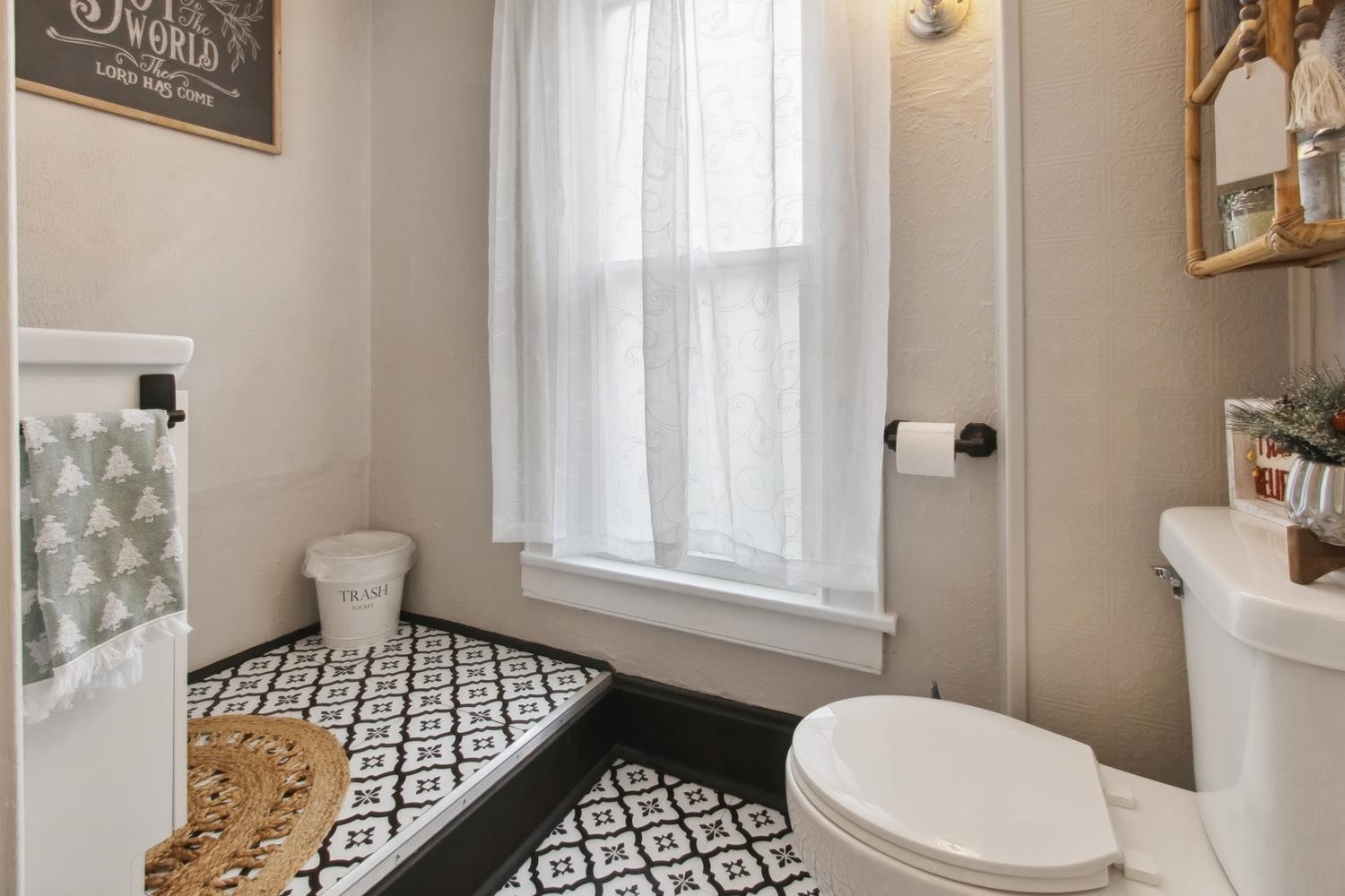 108 Maple Avenue Morrison, IL 61270 - Photo 24 of 28 a bathroom with a toilet a sink and a window