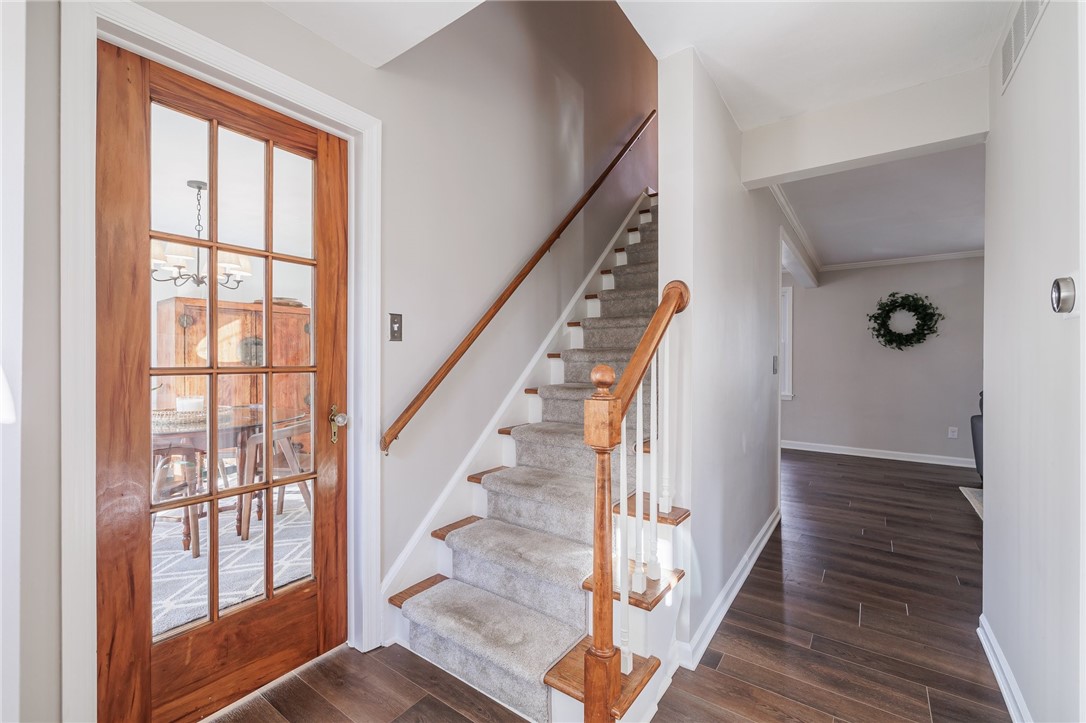 693 Audley End Webster, NY 14580 - Photo 14 of 41 FRONT ENTRY FOYER DINING TO THE LEFT AND FLEX ROOM