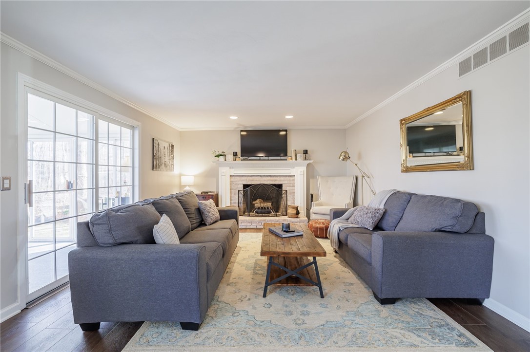 693 Audley End Webster, NY 14580 - Photo 27 of 41 FAMILY ROOM SLIDING GLASS DOORS ENTER TO THE 3 SEA