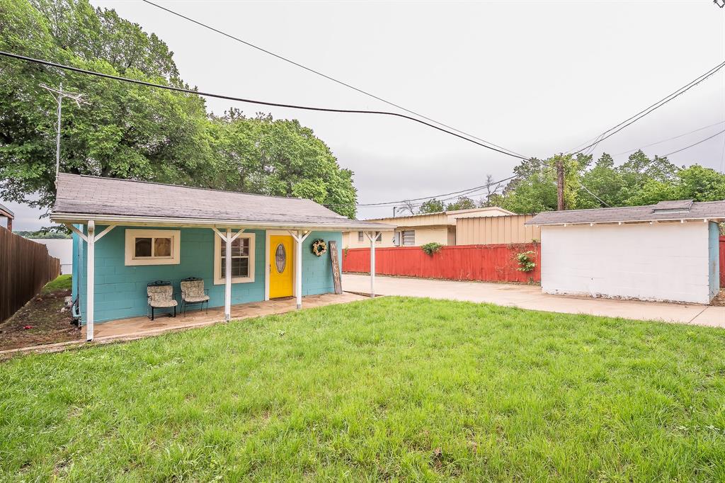 14064 Rucker Street Azle, TX 76020 - Photo 21 of 40 a view of a house with a yard and sitting area