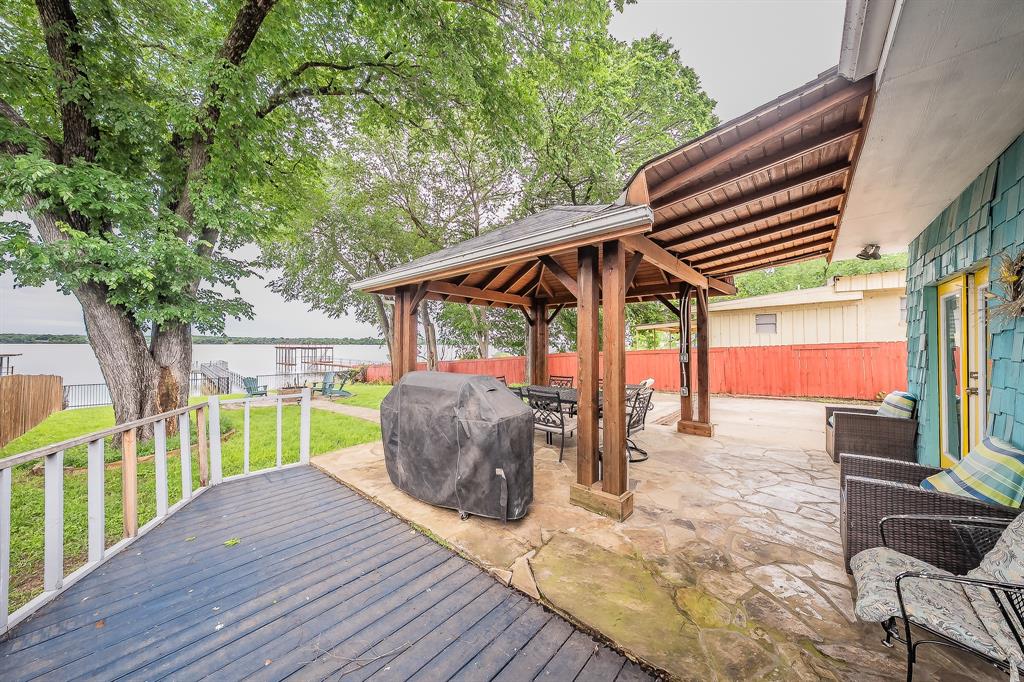 14064 Rucker Street Azle, TX 76020 - Photo 27 of 40 a front view of a house with patio