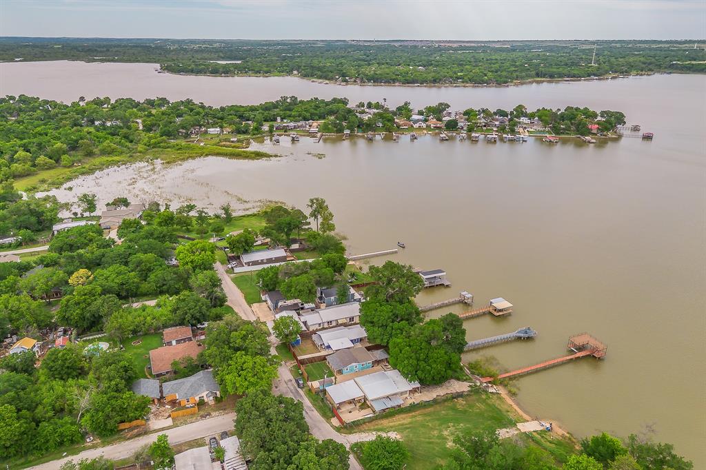 14064 Rucker Street Azle, TX 76020 - Photo 3 of 40 an aerial view of a house with a lake view