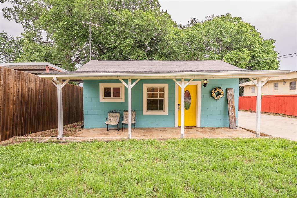 14064 Rucker Street Azle, TX 76020 - Photo 6 of 40 a view of a house with backyard porch and furniture