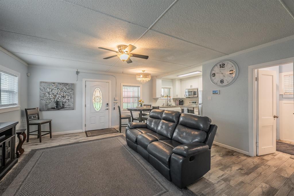 14064 Rucker Street Azle, TX 76020 - Photo 7 of 40 a living room with furniture and a window