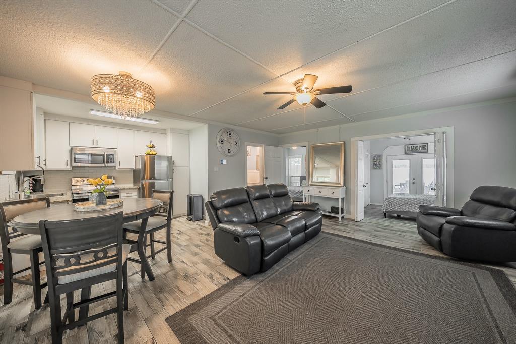 14064 Rucker Street Azle, TX 76020 - Photo 10 of 40 a living room with furniture kitchen view and a window