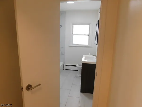 a bathroom with a sink and a vanity