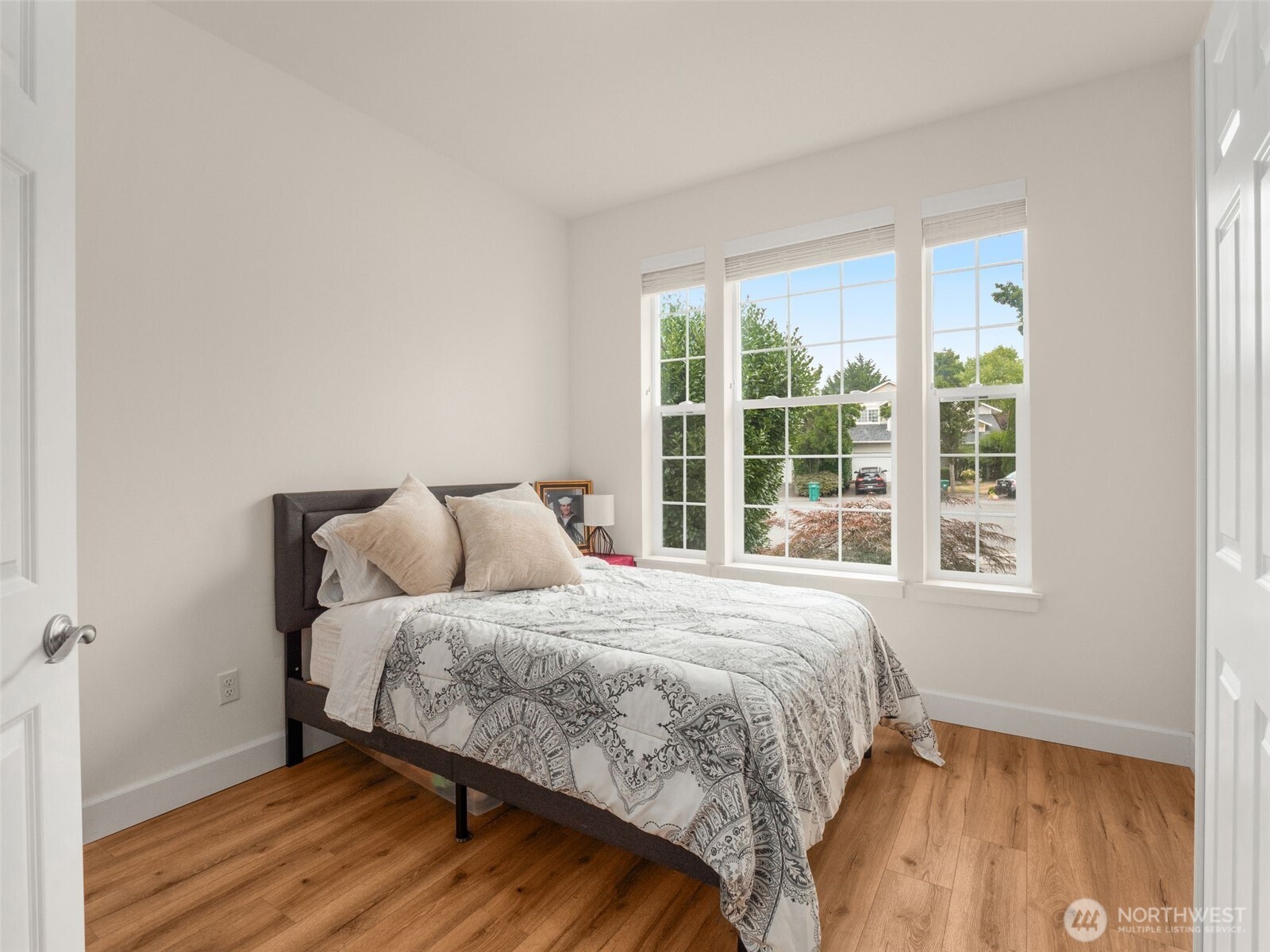 4620 151st Place Southeast Bothell, WA 98012 - Photo 12 of 33 a bedroom with a bed and a large window