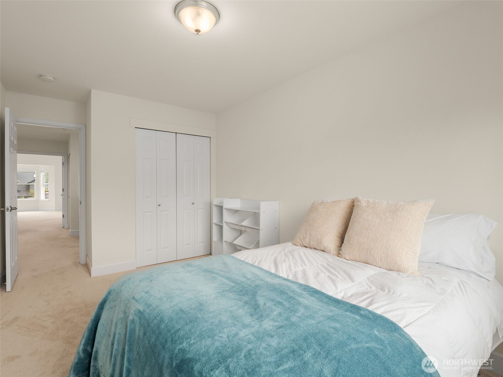 4620 151st Place Southeast Bothell, WA 98012 - Photo 17 of 33 a bedroom with a bed and closet