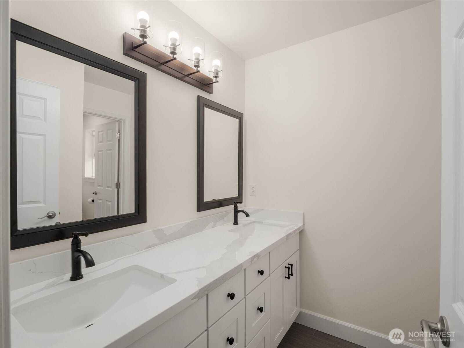 4620 151st Place Southeast Bothell, WA 98012 - Photo 20 of 33 a bathroom with a sink and a mirror