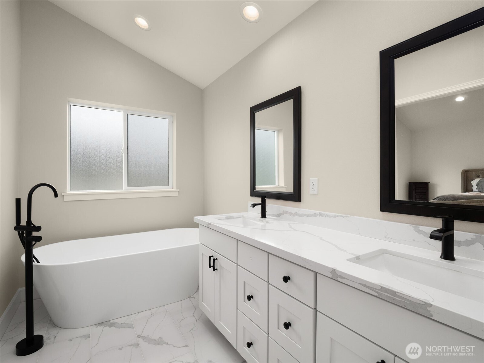 4620 151st Place Southeast Bothell, WA 98012 - Photo 28 of 33 a bathroom with a tub sink and mirror