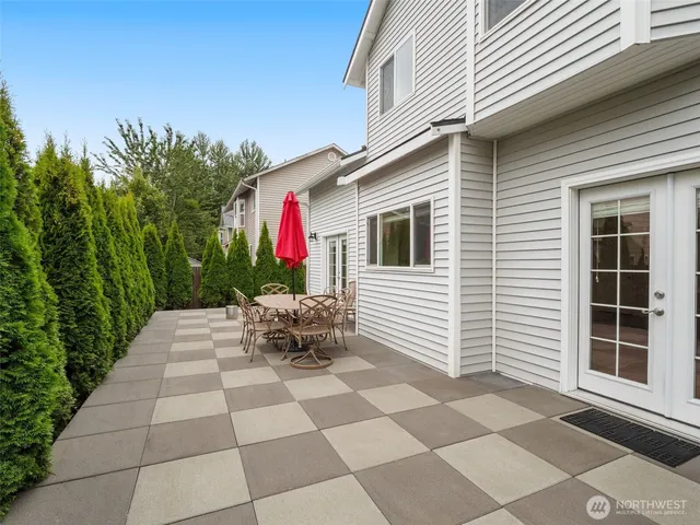 a front view of a house with patio