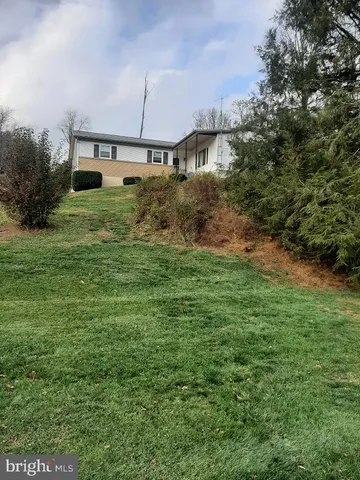 a house view with a garden space