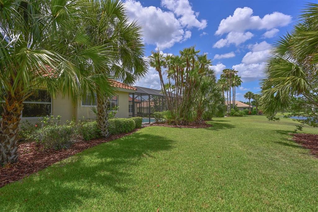 10622 Conch Shell Terrace Bradenton, FL 34212 - Photo 51 of 69 a front view of house with yard and green space