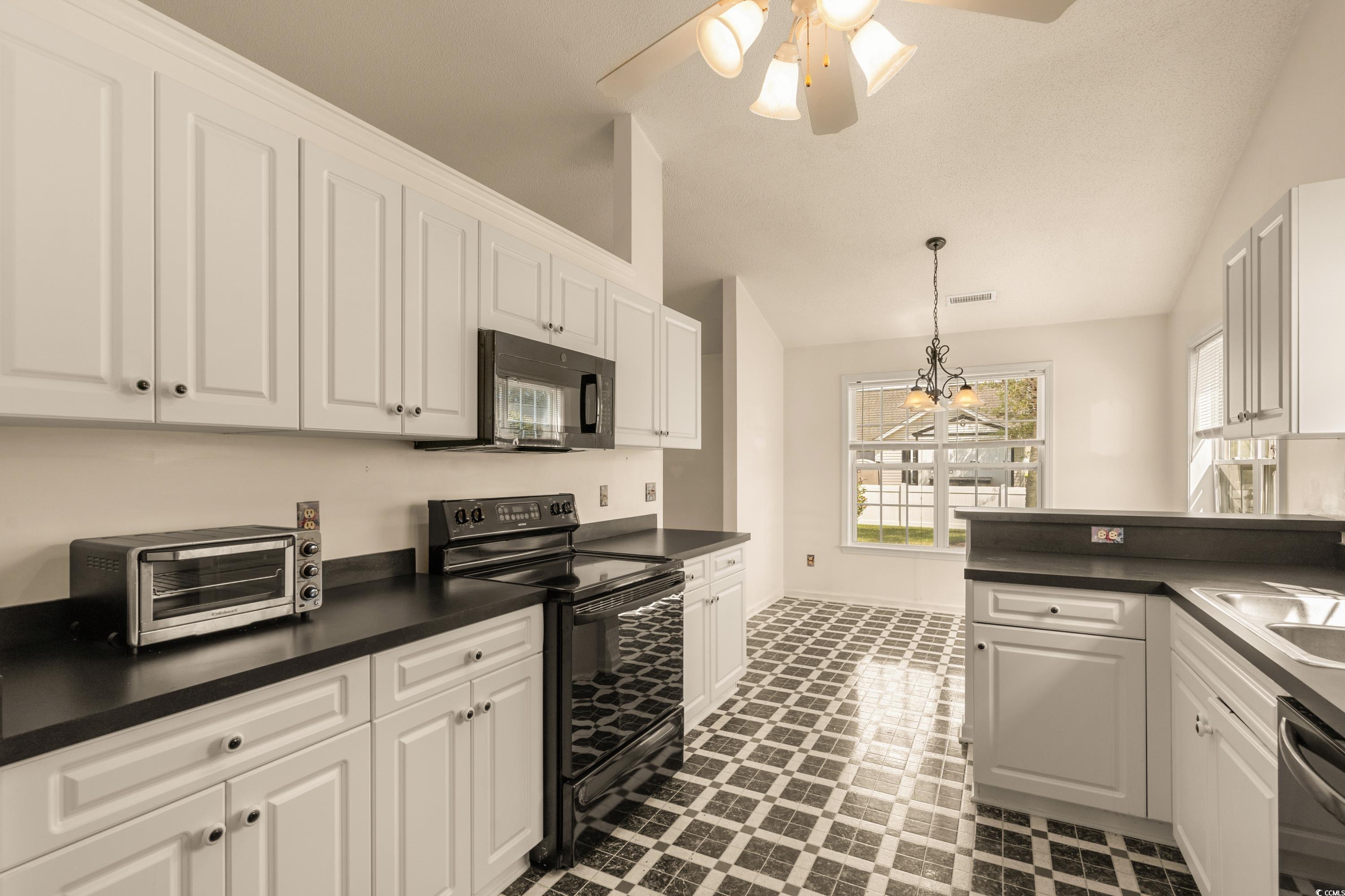 2001 Neath Court Myrtle Beach, SC 29588 - Photo 8 of 31 Kitchen with ceiling fan with notable chandelier,