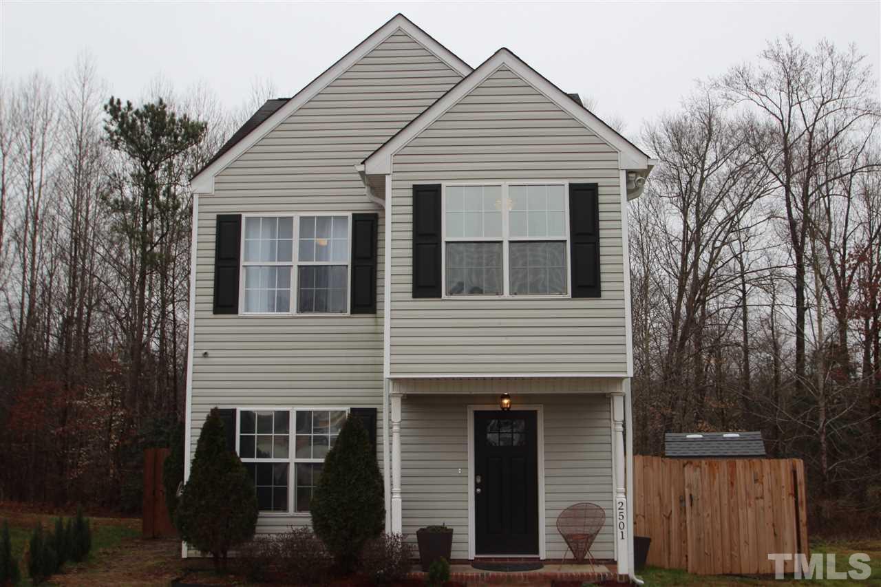 2501 Lilymount Drive Raleigh, NC 27610 - Photo 1 of 10 a view of a white house with large windows
