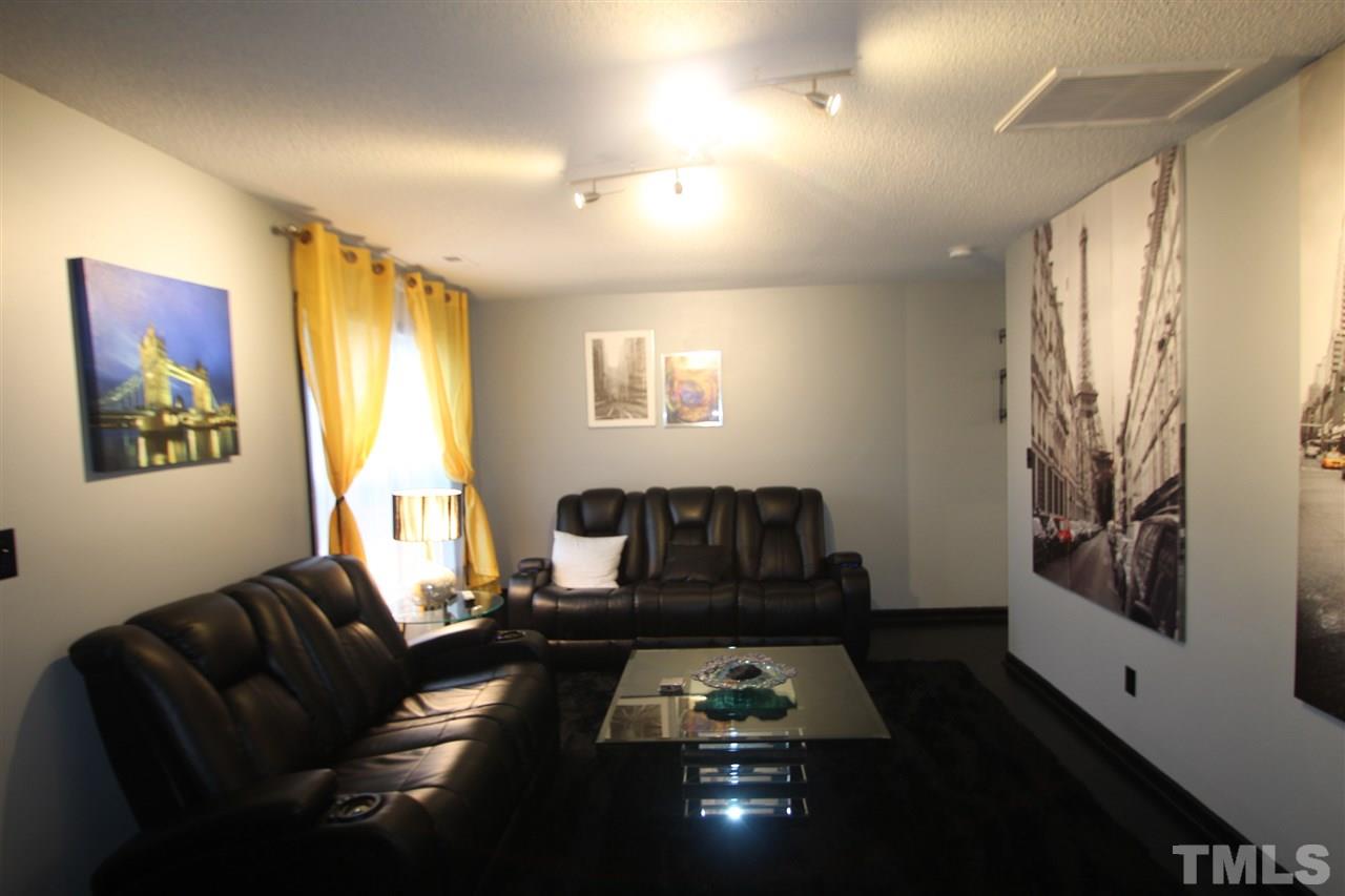 2501 Lilymount Drive Raleigh, NC 27610 - Photo 3 of 10 a living room with furniture and a window