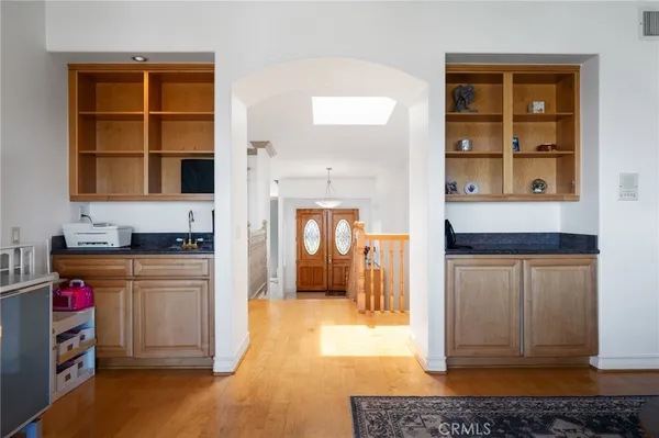 a kitchen with stainless steel appliances granite countertop a stove and a refrigerator