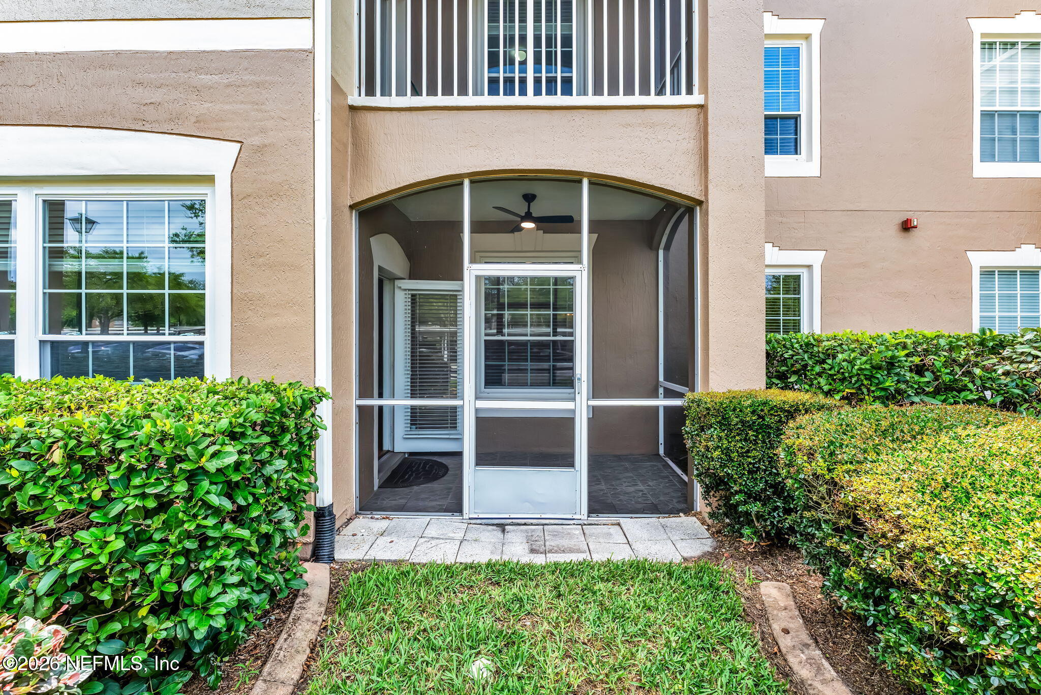 7990 Baymeadows Road East, Unit 520 Jacksonville, FL 32256 - Photo 29 of 41 front view of a house with a yard