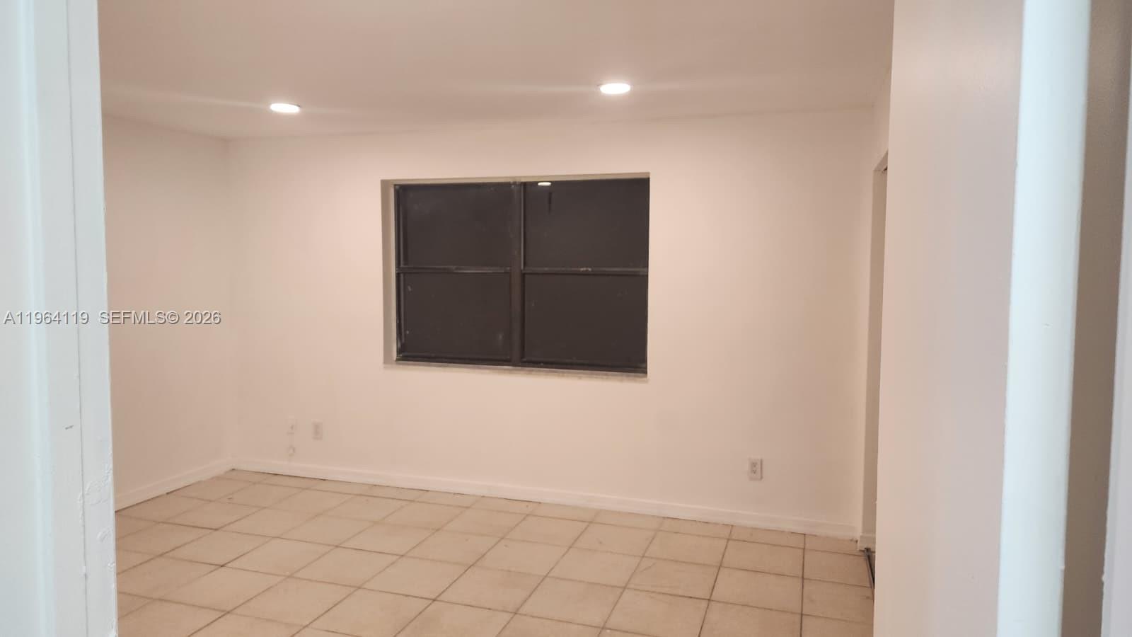 4108 Riverside Drive, Unit 2 Coral Springs, FL 33065 - Photo 6 of 11 a view of an empty room