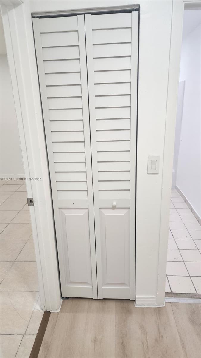 4108 Riverside Drive, Unit 2 Coral Springs, FL 33065 - Photo 9 of 11 a view of a house with white door