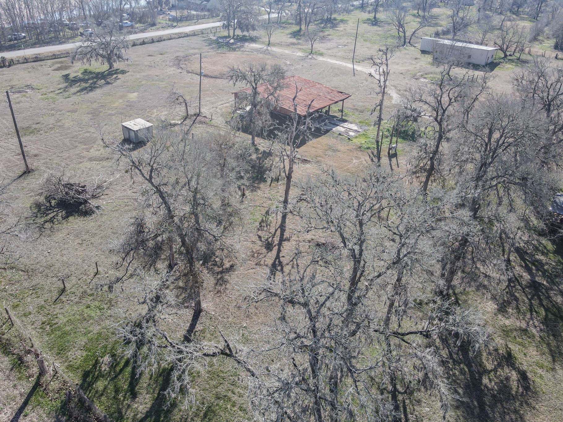 0 Hackamore Road Wallis, TX 77485 - Photo 18 of 33 a view of a dry yard with wooden fence