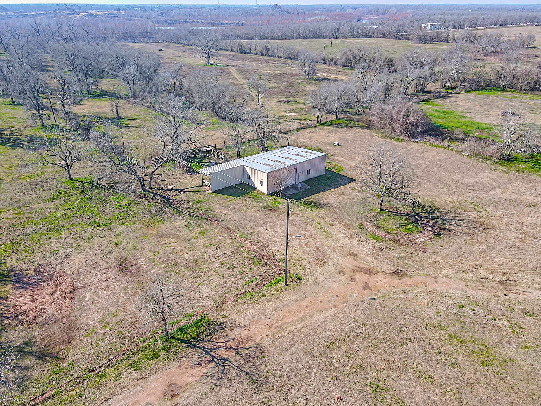 0 Hackamore Road Wallis, TX 77485 - Photo 19 of 33 a backyard of a house with table and chairs