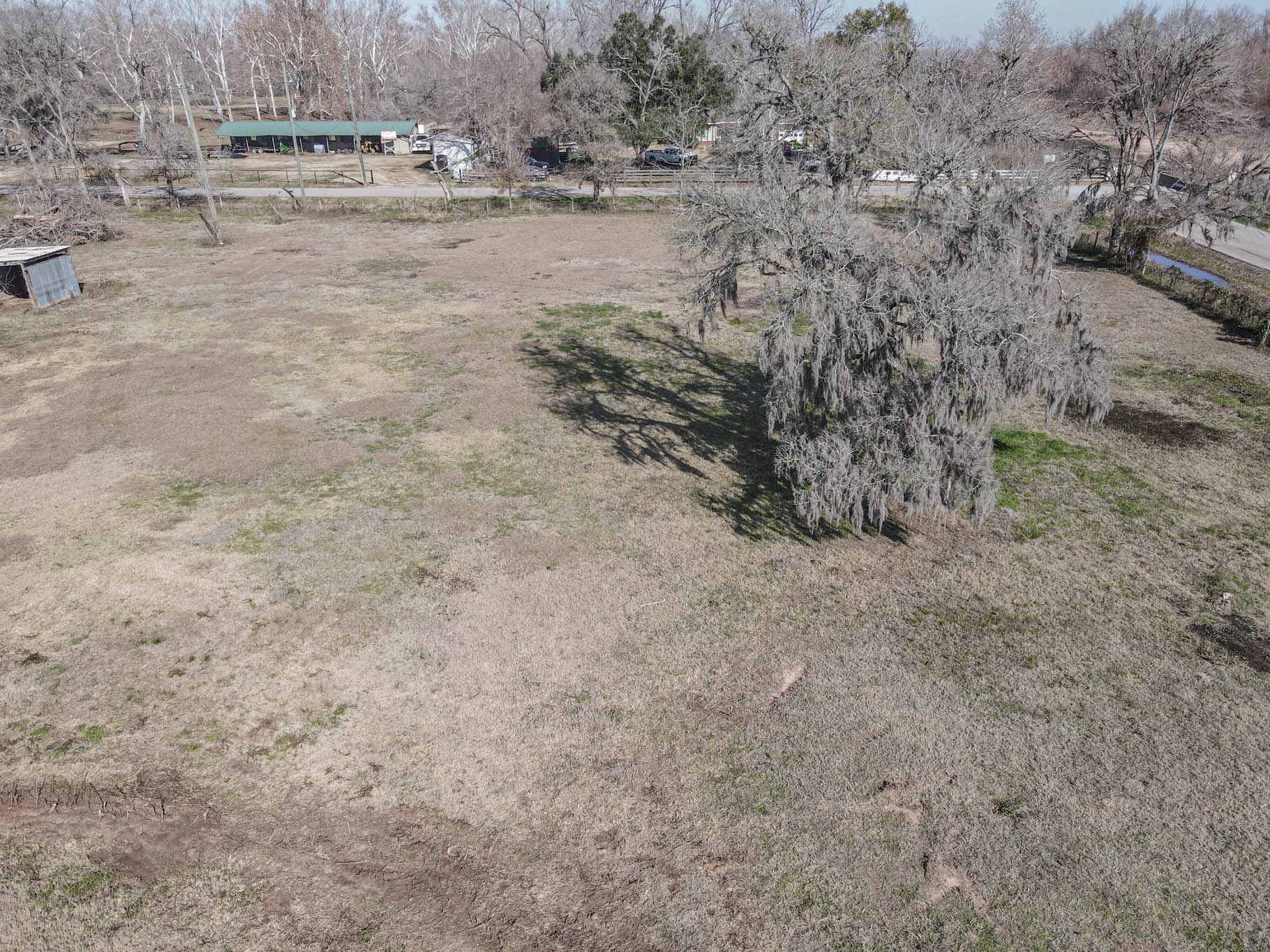 0 Hackamore Road Wallis, TX 77485 - Photo 20 of 33 a view of a dry yard with trees