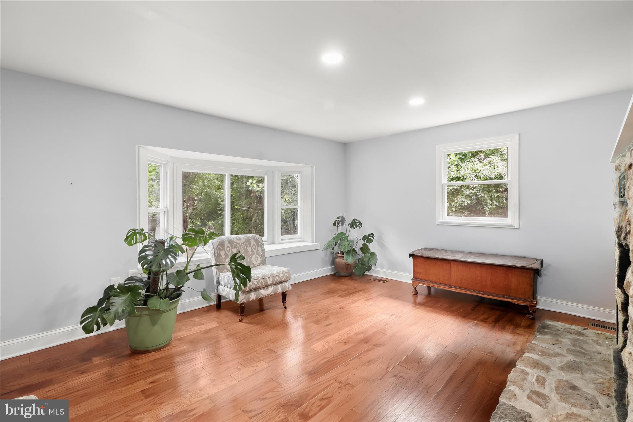 14213 Longnecker Road Reisterstown, MD 21136 - Photo 13 of 44 a living room with furniture and a potted plant
