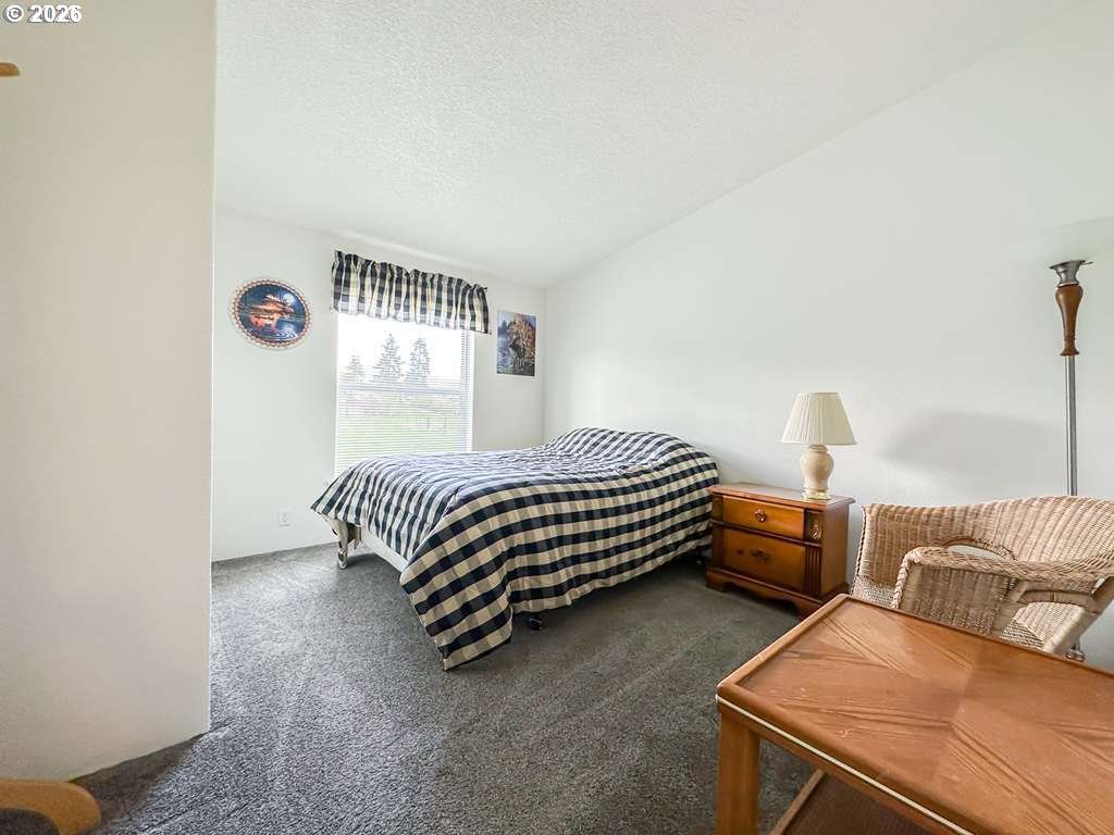 46198 Slaughterhouse Road Halfway, OR 97834 - Photo 16 of 40 a bedroom with a bed and a window