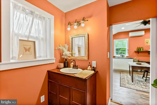 a huge green field with lots of trees