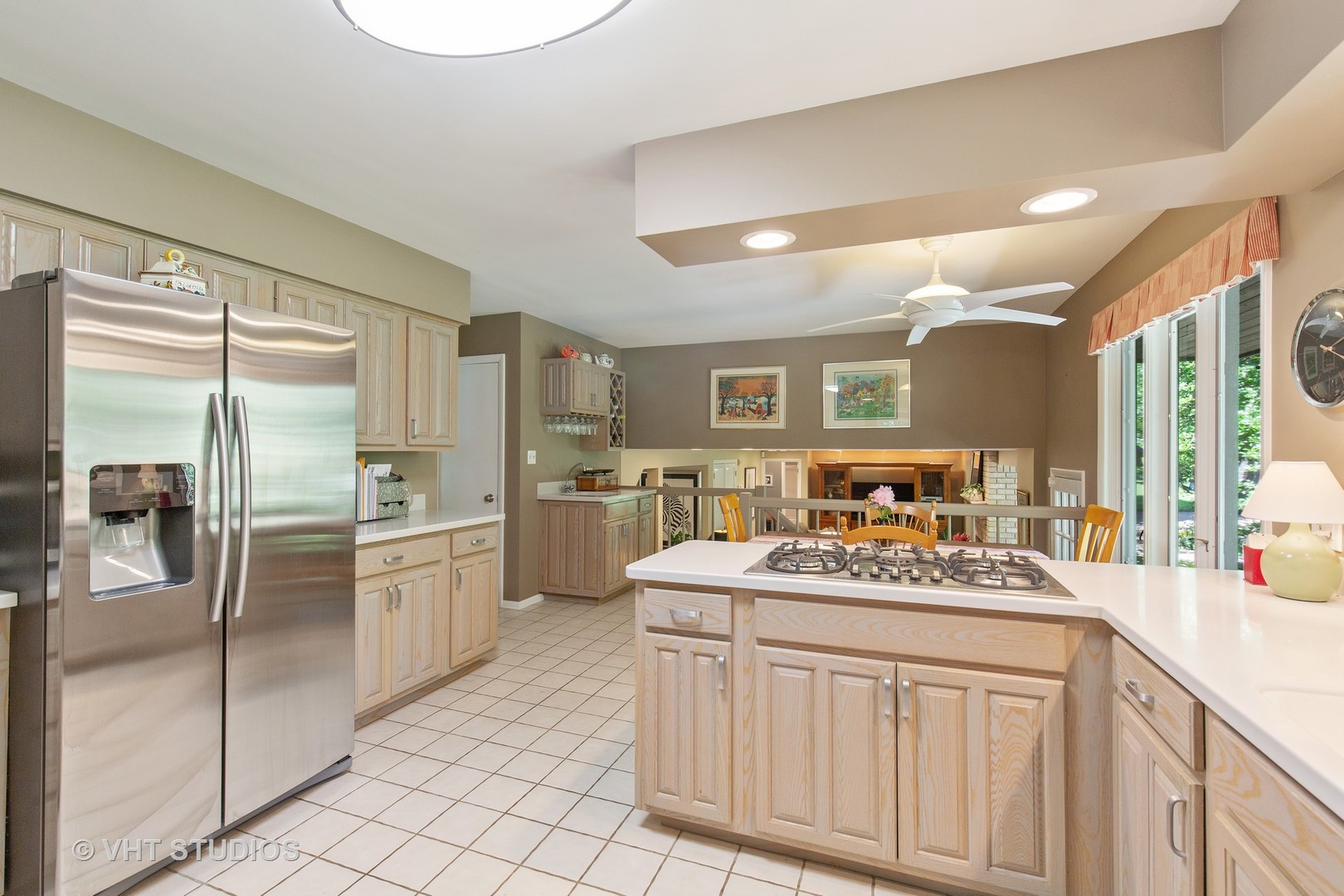 465 Riverside Drive Crystal Lake, IL 60014 - Photo 11 of 30 a kitchen with stainless steel appliances granite countertop a sink and cabinets