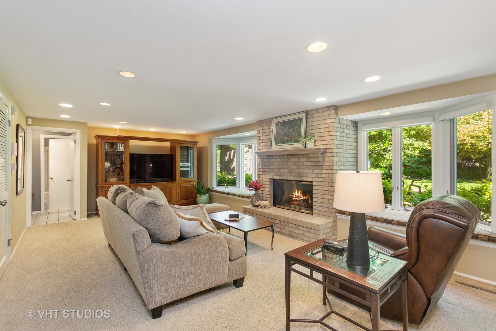 465 Riverside Drive Crystal Lake, IL 60014 - Photo 14 of 30 a living room with furniture fireplace and a large window