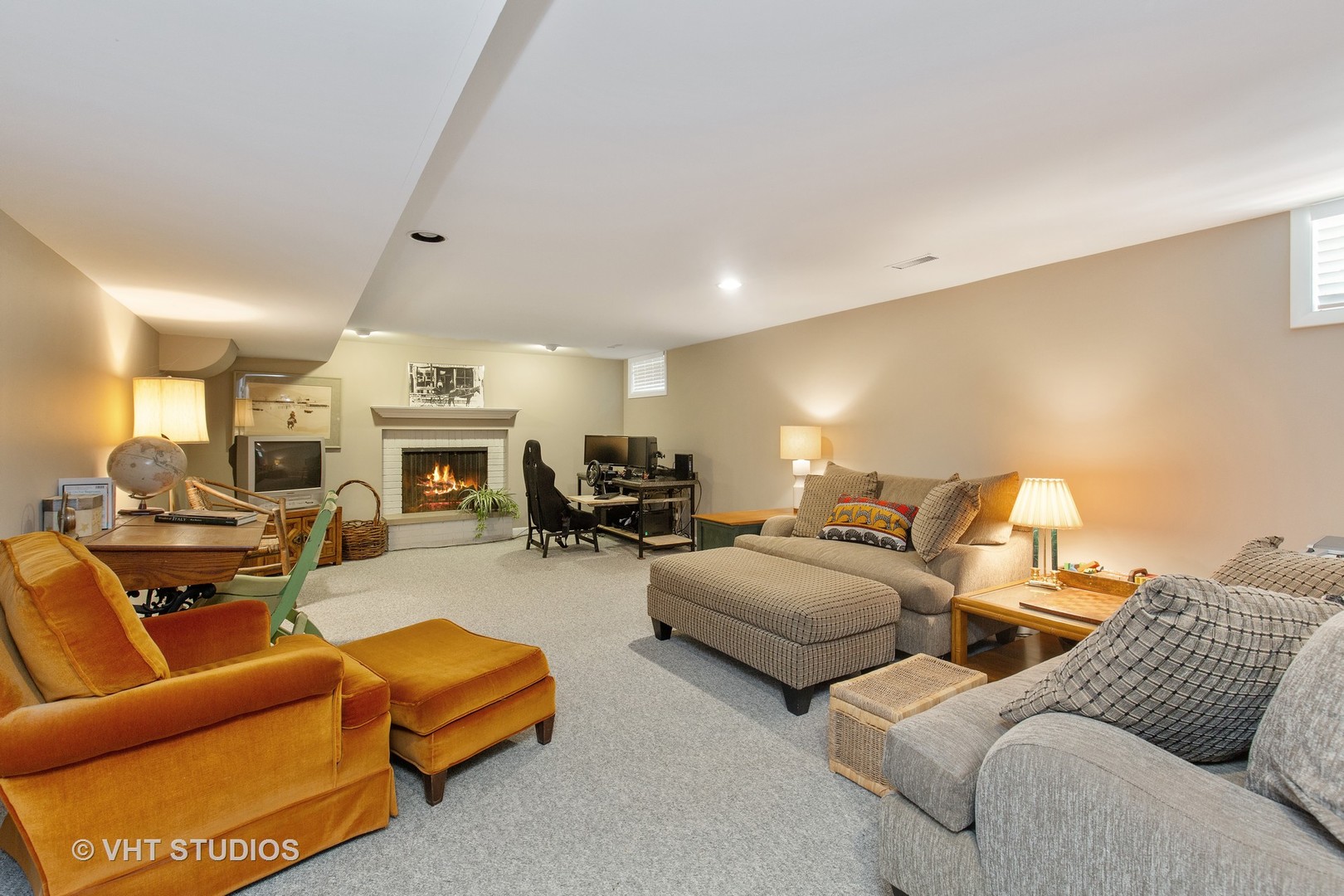 465 Riverside Drive Crystal Lake, IL 60014 - Photo 24 of 30 a living room with furniture fireplace and a mirror