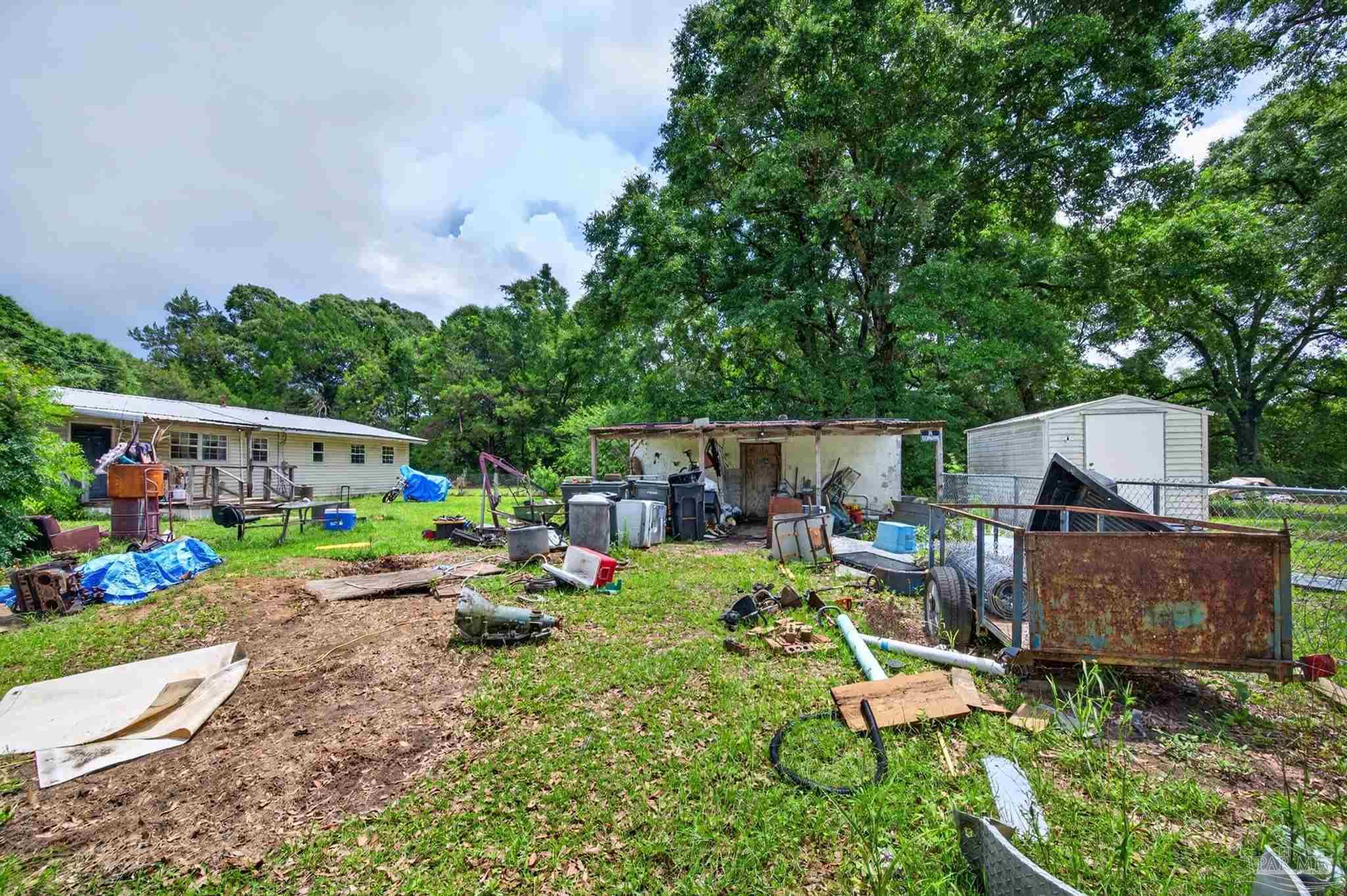 6253 Allentown Road Milton, FL 32570 - Photo 26 of 31 a view of play ground and a fountain