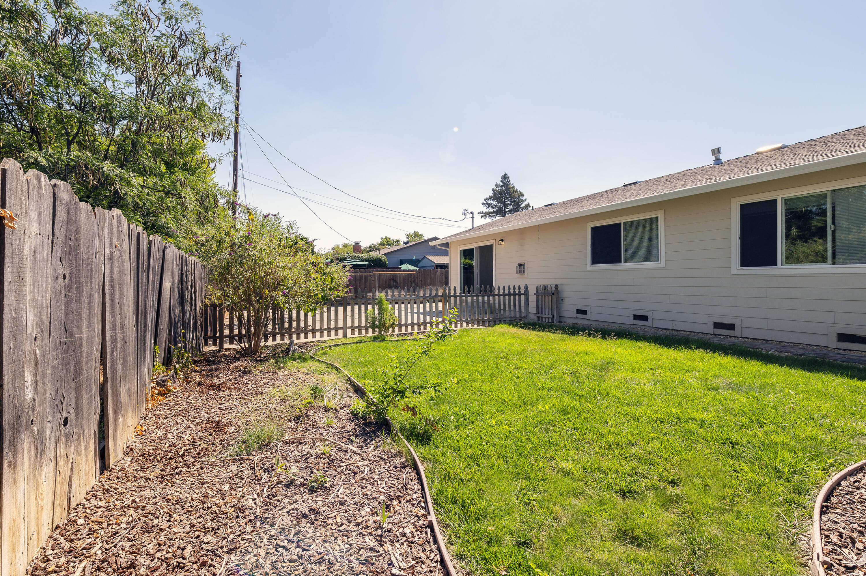 601 Green Street Willows, CA 95988 - Photo 21 of 23 a view of a house with a backyard