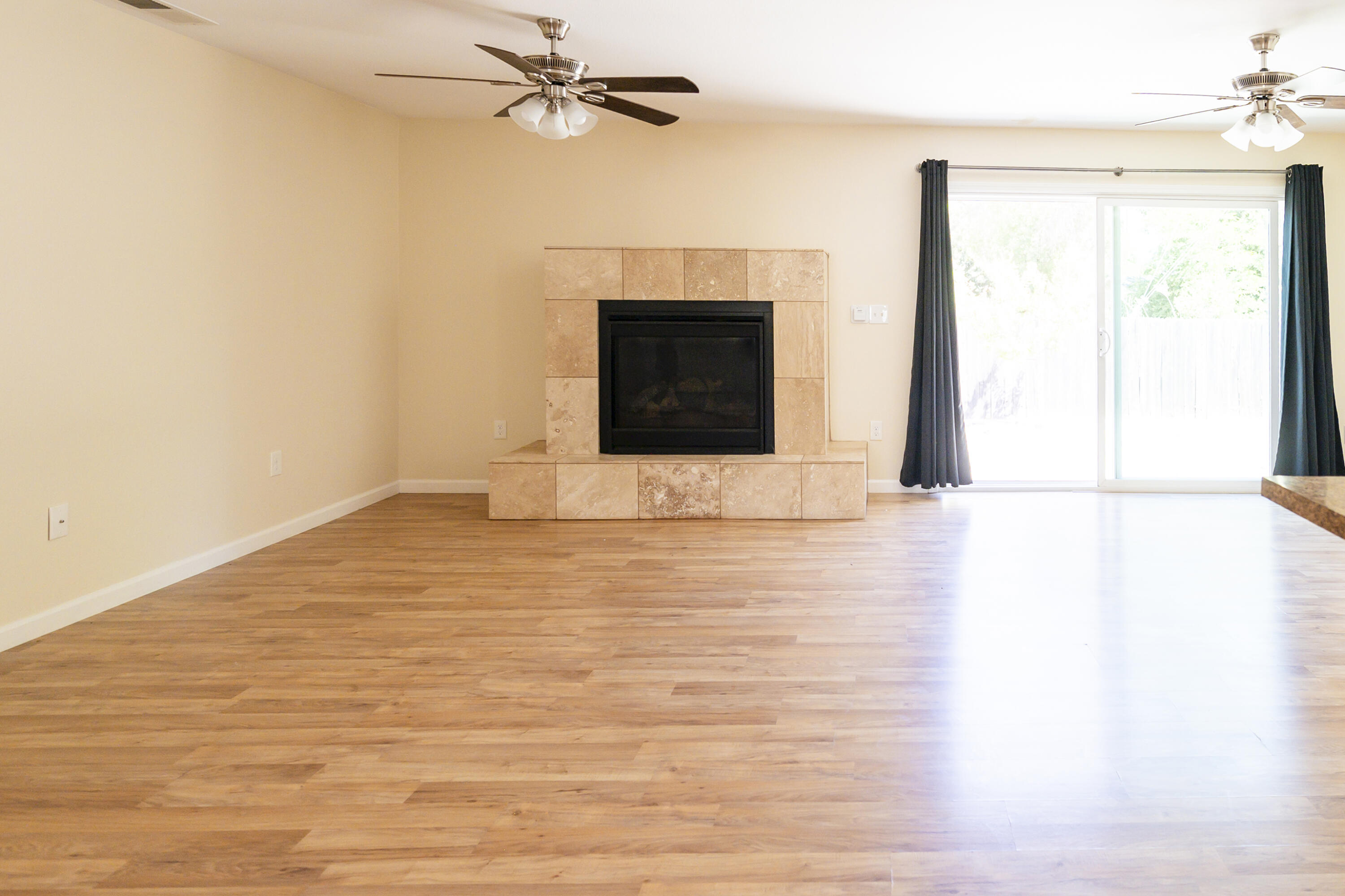 601 Green Street Willows, CA 95988 - Photo 7 of 23 a view of a room with wooden floor and white walls