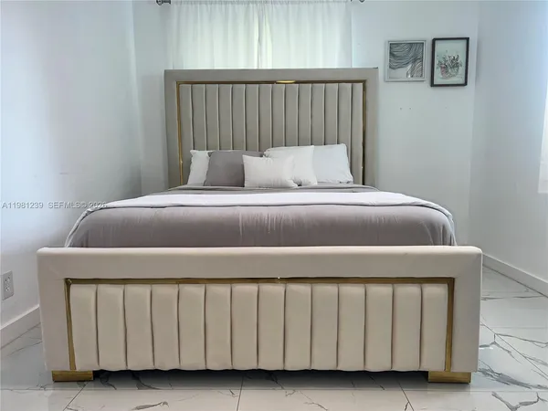 a bedroom with a bed
