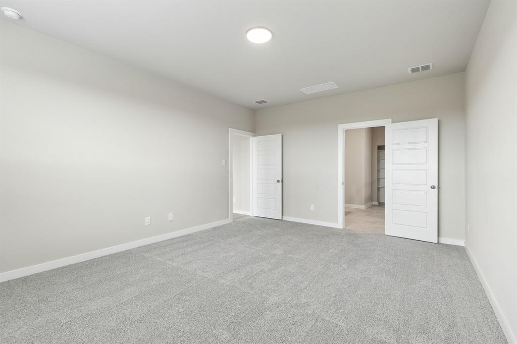 2303 Wind River Road Princeton, TX 75407 - Photo 13 of 32 Primary Suite in the Winters home plan by Trophy Signature Homes – REPRESENTATIVE PHOTO