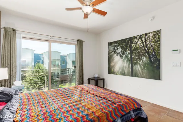 a bathroom with a sink vanity and a toilet