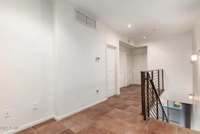 a view of a building with a yard