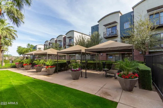 a view of swimming pool from a outdoor seating