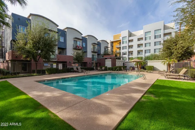 a pathway of a house with a yard