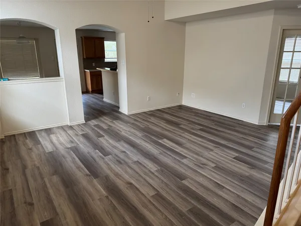 a view of a kitchen from the hallway