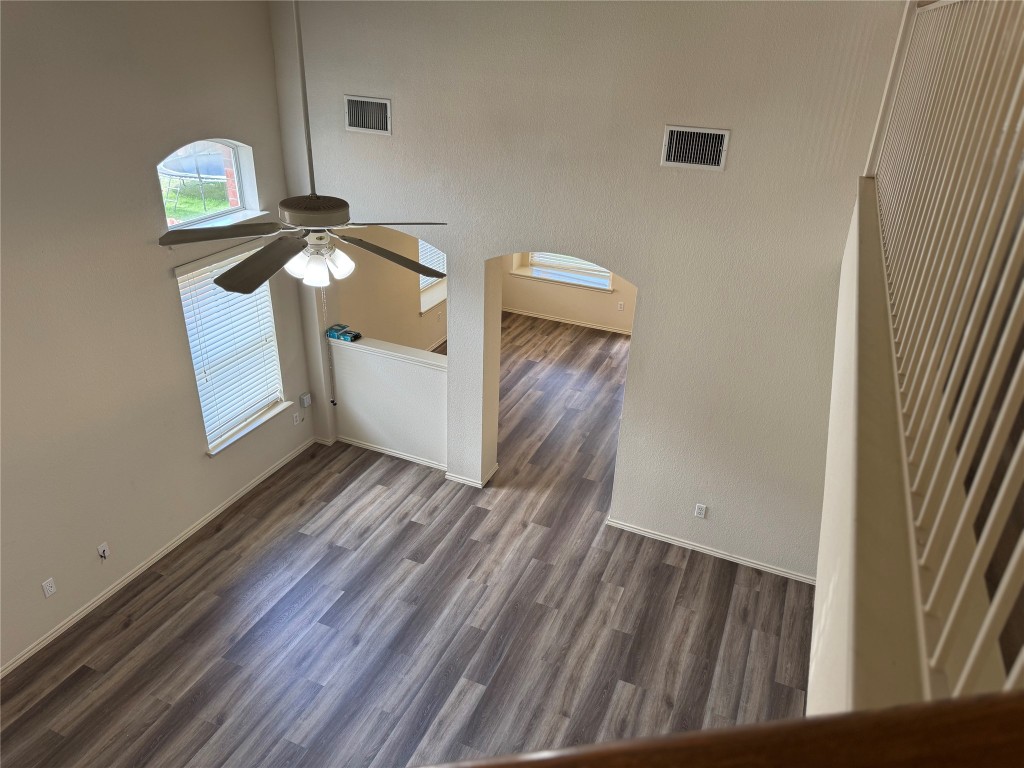 501 Grey Feather Court Round Rock, TX 78665 - Photo 25 of 28 a view of a livingroom with wooden floor